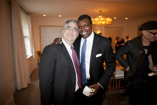 Jonathan Scheer, master dry cleaner and preserver of wedding gowns, with Mark