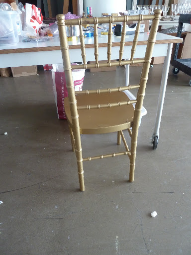 A classic gold reception chair from Party Rental Ltd.