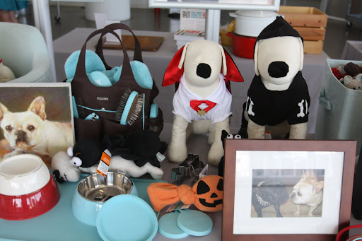 Our station also had lots of our new and great PetSmart products.  The dog models are wearing some of our awsome clothing line.  The portrait of Sharkey was painted by a fan called Le Roy.
