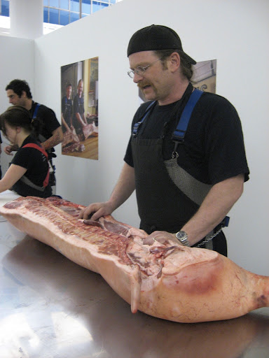 That is an entire half of a hog. Fleisher's Grass Fed and Organic Meats co-owner, Josh Applestone, is about to butcher it in front of an audience.
