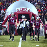 The Griz captains head to center field for the coin toss.