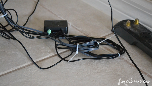HOW TO: Easily keep electronic cords out of sight with two very inexpensive supplies