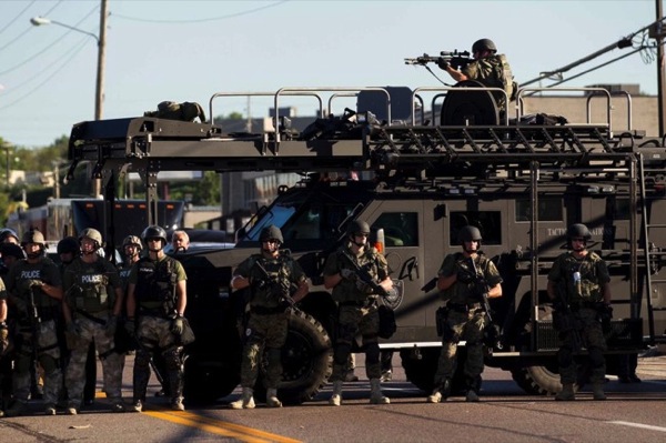 CC Photo Google Image Search Source is pbs twimg com  Subject is militarized police