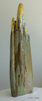 076 - Falaise d'Or - 1997<br />
H 128,5 x 23<br />
Sculpture bois doré et or
