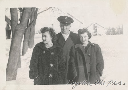 Navy and two gals Moorhead Antiques Developed May 27 1943 Minneapolis