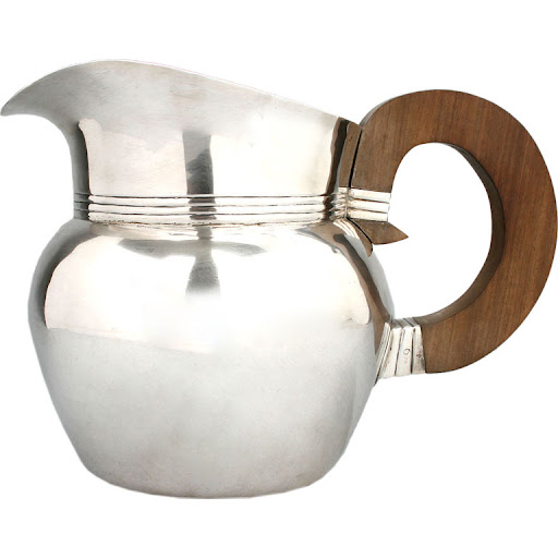 Distressed finishing and wooden accents make this pitcher look like a relic. (douglas rosin,1stdibbs.com) Distressed finishing and wooden accents make this pitcher look like a relic. (douglas rosin,1stdibbs.com)