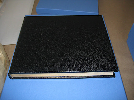 Here's a black album from Smythson. Note the elegantly gilded edges on the pages.