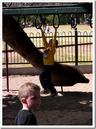 Christian on the monkey bars Christian on the monkey bars