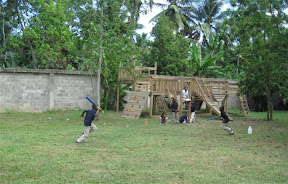 Eduardo and Wilsenci run back and forth until someone gets the ball.