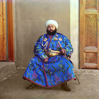 The Emir of Bukhara, Alim Khan (1880-1944), poses solemnly for his portrait, taken in 1911 shortly after his accession. As ruler of an autonomous city-state in Islamic Central Asia, the Emir presided over the internal affairs of his emirate as absolute monarch, although since the mid-1800s Bukhara had been a vassal state of the Russian Empire. With the establishment of Soviet power in Bukhara in 1920, the Emir fled to Afghanistan where he died in 1944. This photograph was Digitally Rendered in Color. The original photograph was taken in 1911. http://www.loc.gov/exhibits/empire/ethnic.html emir.jpg