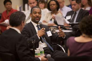 John B. Rhea, Chairman of the NYC Housing Authority, discusses affordable housing at a Leading Large Scale Change executive briefing.  Photo: Sam Hollenshead