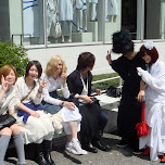 Japanese cosplayers making peace signs on Omotesando street in Harajuku, Japan 