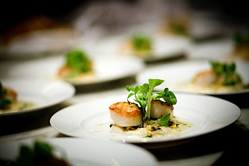 Roasted scallops with cauliflower, pineapple, capers, and coriander vinaigrette. Roasted scallops with cauliflower, pineapple, capers, and coriander vinaigrette.