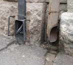 These downspouts have been pictured by another visitor loke here: http://www.flickr.com/photos/85737493@N00/3672783129/