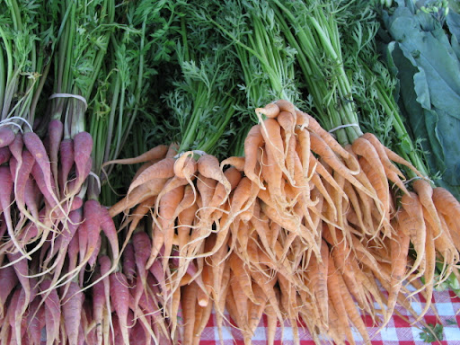 Various types of produce are abound at the market.