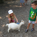 Bryan watching Hannah brush a goat at the Nashville Zoo 09032011a