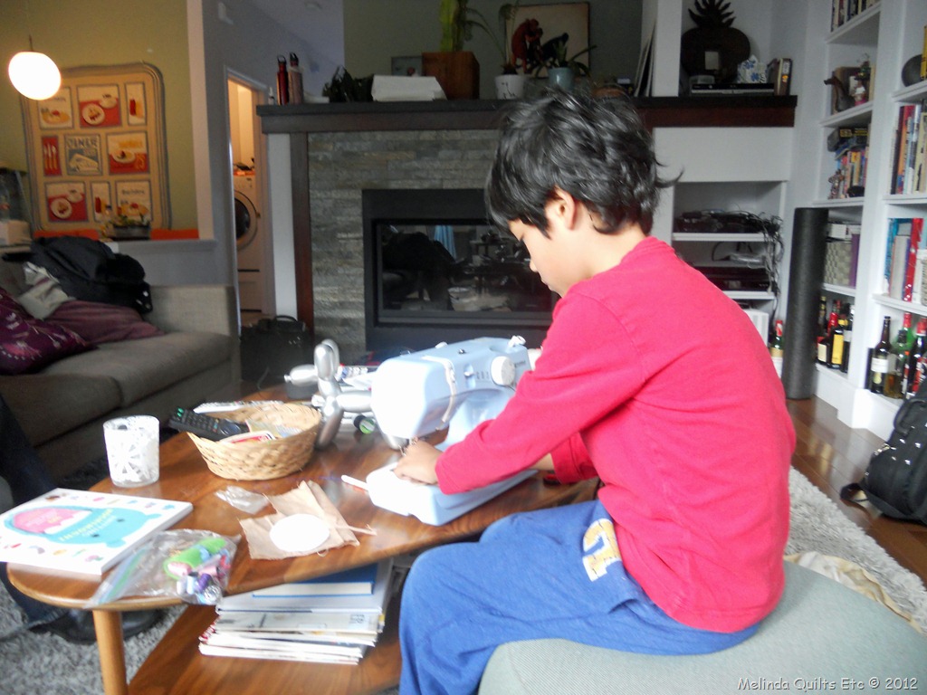 [Emilio%2520Sewing%2520021812%255B3%255D.jpg]