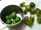 Start by removing the tomatillo husks and putting them in a pan with a jalapeño (which I left out because I was cooking for kids).