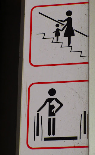 It cautions parents about how to keep both little humans AND their fur kids safe on an escalator! It cautions parents about how to keep both little humans AND their fur kids safe on an escalator!