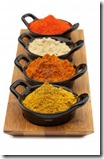 9887650-tray-of-spices-in-small-black-bowls--includes-madras-curry-powder-malaysian-curry-powder-ground-ging