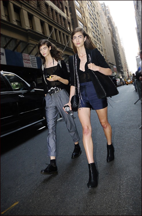2 models after calvin klein grey pleated pants blue tailored shorts wing tips ankle boots black see thru tops ol