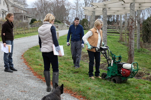 Look at Martha operating that sod cutter!  She likes to try everything.