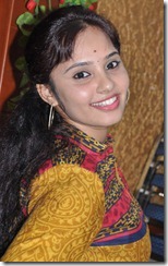 Actress Aarushi Cute Stills in Mustard Color Salwar Kameez