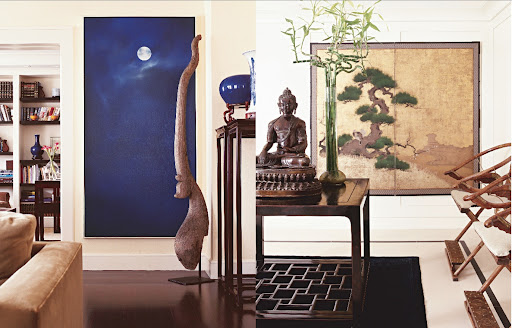 Nautica founder David Chu, now owner of David Chu Bespoke, owns a Mongolian rug to protect a limestone entrance and an antique Buddha next to lucky bamboo presides over the rest. Painting, left, is by Dutch artist Jan Grotenbreg and the wooden sculpture is from a Thai temple. Nautica founder David Chu, now owner of David Chu Bespoke, owns a Mongolian rug to protect a limestone entrance and an antique Buddha next to lucky bamboo presides over the rest. Painting, left, is by Dutch artist Jan Grotenbreg and the wooden sculpture is from a Thai temple.
