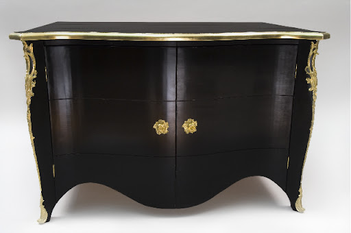High shine and intricate, gilded details lend refinement to this lovely lacquered French Bombee Chest. High shine and intricate, gilded details lend refinement to this lovely lacquered French Bombee Chest.