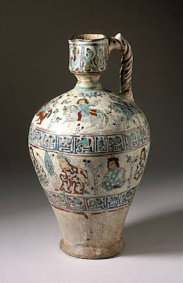 Ewer Iran Ewer, late 12th century - early 13th century Ceramic; Vessel, Fritware, overglaze painted (mina'i), Height: 13 in. (33.0 cm) The Madina Collection of Islamic Art, gift of Camilla Chandler Frost (M.2002.1.7) Art of the Middle East: Islamic Department.