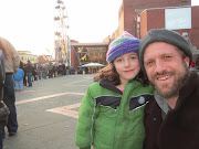 Aviva and Ben enjoying the fun at the seasonal ferris wheel in Spirit Square