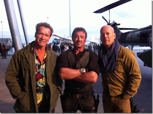 Arnold Schwarzenegger, Sylvester Stallone and Bruce Willis. From Arnie's Twitter account: Back in action for The Expendables 2! I'm having a fantastic time on set with Bruce and Sly in Bulgaria.