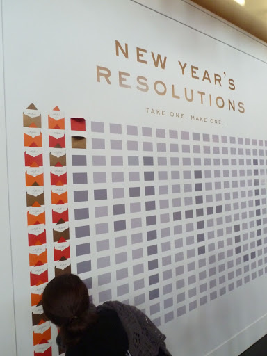 Cheree Berry designed the resolutions wall as a vinyl. Once it was applied with a brayer, the envelopes were adhered and filled with their resolution cards in a random pattern. Cheree Berry designed the resolutions wall as a vinyl. Once it was applied with a brayer, the envelopes were adhered and filled with their resolution cards in a random pattern.