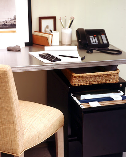 Metal filing cabinets are useful for files you need to have on hand at your desk.