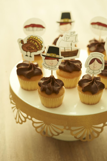 These cupcakes are decorated with my Thanksgiving artwork. Download them here: http://www.marthastewart.com/951490/darcy-millers-thanksgiving-ideas, then simply cut them out and tape them to toothpicks. These cupcakes are decorated with my Thanksgiving artwork. Download them here: http://www.marthastewart.com/951490/darcy-millers-thanksgiving-ideas, then simply cut them out and tape them to toothpicks.