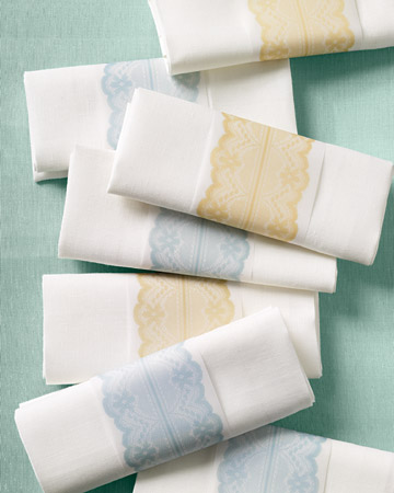 Straight-edged and simply presented, these lace napkin rings strike a modern note. (marthastewartweddings.com) Straight-edged and simply presented, these lace napkin rings strike a modern note. (marthastewartweddings.com)
