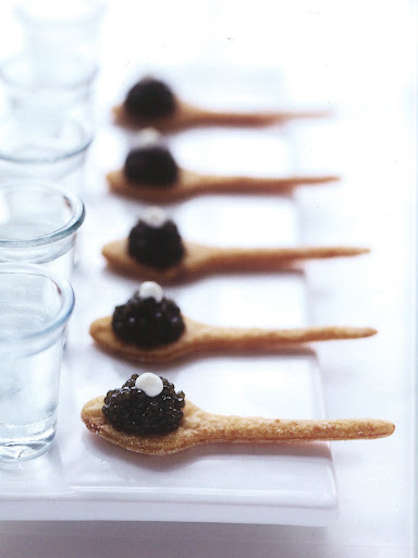 This edible spoon pokes fun at the traditional way of serving caviar (on a mother of pearl spoon). Peter serves his with a shot of vodka, as it should be. This edible spoon pokes fun at the traditional way of serving caviar (on a mother of pearl spoon). Peter serves his with a shot of vodka, as it should be.