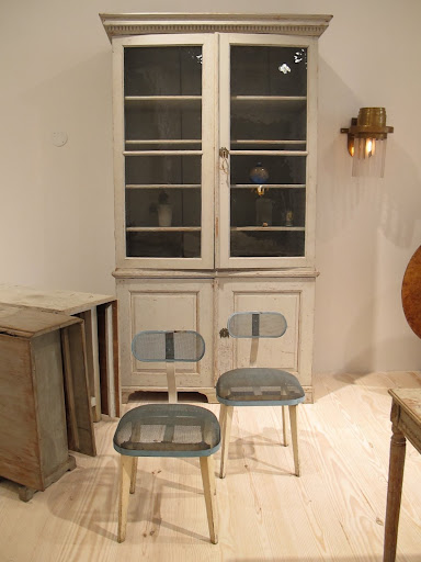 The juxtaposition of these chairs with this cabinet is what Jill does so well.