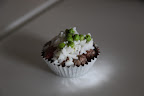 It's because dogs reach maturity much faster than humans!  By age 2, for example, no longer a puppy, I was considered an adult dog!  Humans are still babies at 2.  Hey G.K., how does my cupcake look?