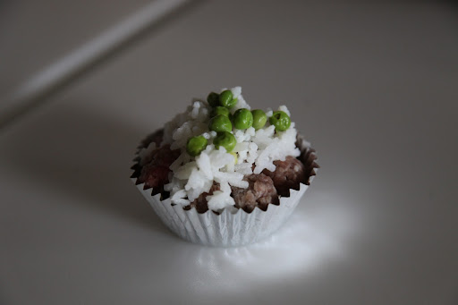 It's because dogs reach maturity much faster than humans!  By age 2, for example, no longer a puppy, I was considered an adult dog!  Humans are still babies at 2.  Hey G.K., how does my cupcake look?