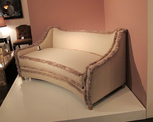 The trim on this sofa is so inviting; the feet are hand carved in gilt wood. The trim on this sofa is so inviting; the feet are hand carved in gilt wood.