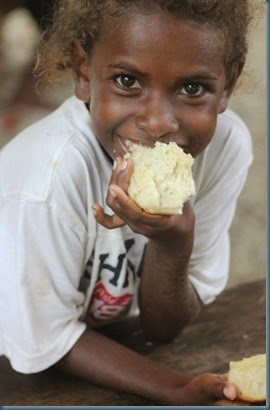 Girl eating bread FRI