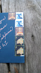 A collection of postage stamps and Melissa's handwritten addresses decked the fronts of the envelopes. A collection of postage stamps and Melissa's handwritten addresses decked the fronts of the envelopes.