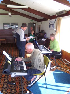 Practice session between 12 and 1 pm for the PumpHouse Concert on 17th May 2012. L to R: Len Hancy, Peter Jackson, Denise Gunson, Barbara McNab, and John Perkin. Brian Gunson on guitar is out of shot.