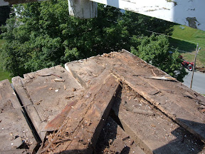 The corner of the bell deck and two of the hip rafters had to be repared.