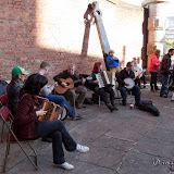 A group of traditional Irish musicians provide accompaniment for the dancers performing in the Anchor Courtyard as the festivities of the day draw to a close. LIF'12-12 Traditional Musicians & Dancers in Anchor Courtyard