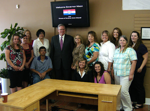 Gov. Jay Nixon poses with the employees of the South Fremont License Office. (photo credit: Sam Senovich)