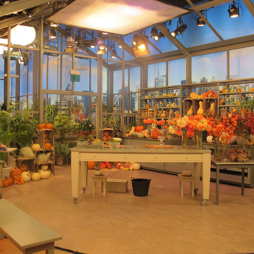 This is the set where I filmed the flower arranging segment for this episode. It's meant to feel like a greenhouse with a view of the city in the background; it works, don't you think?