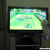 Playing Wii Sports tennis on our Toshiba Regza 32" LCD TV