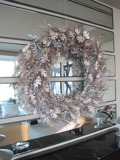 I made the wreath using a 36-inch wire form, from U.S. Evergreens Inc. (usevergreens.com), and shimmery, silver garland from Jamali Garden (jamaligarden.com).
